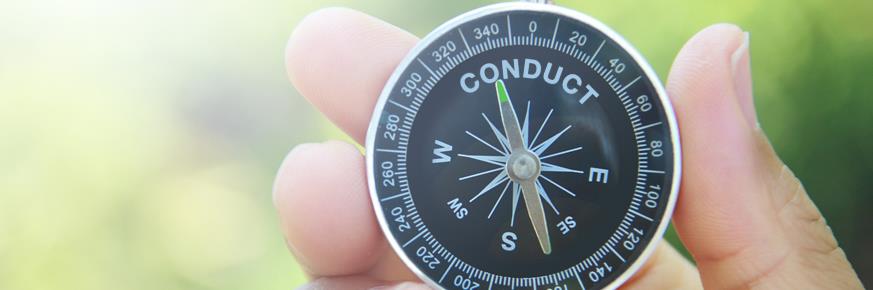 A person holding a compass 