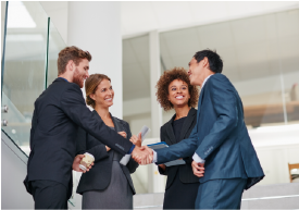 A group of business people shaking hands