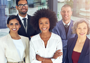 A diverse group of employees standing together 