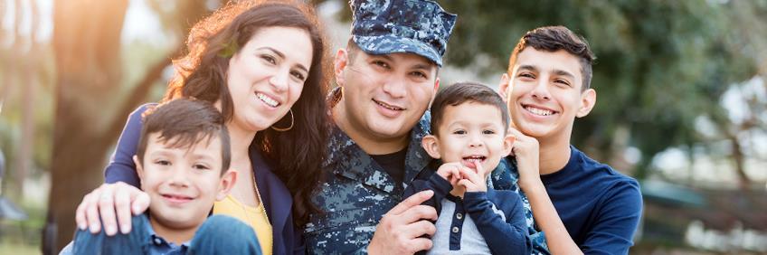 Military family posing for family portrait