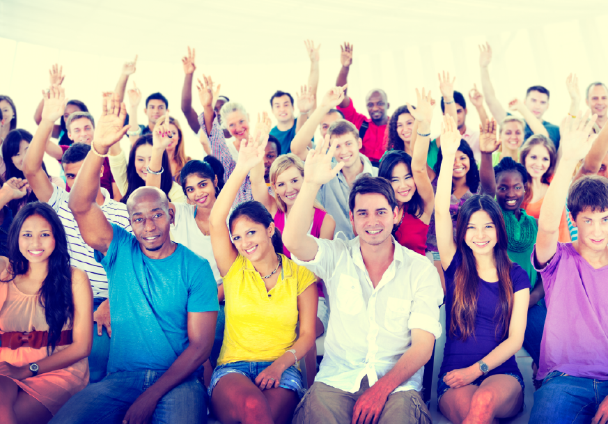 A group of people raising their hands