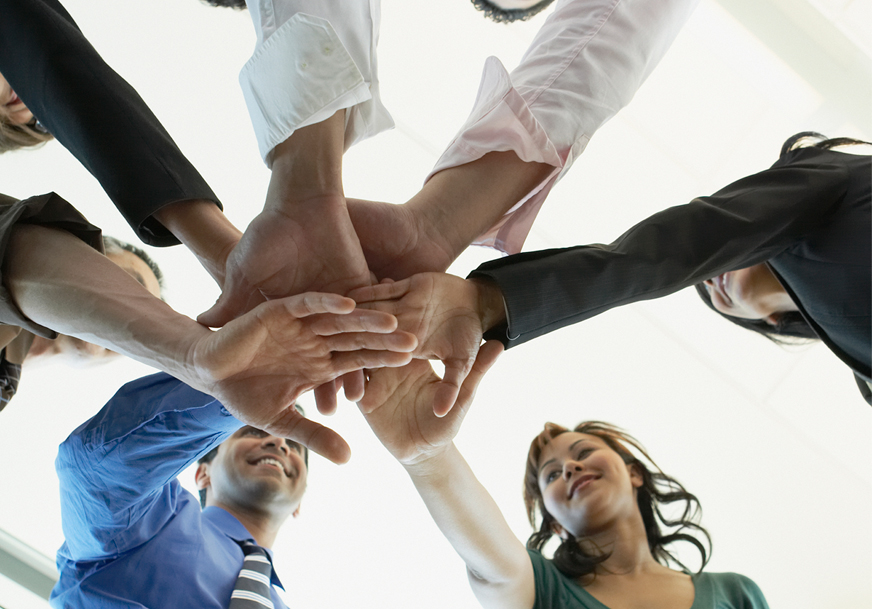 Hands joining together as a group