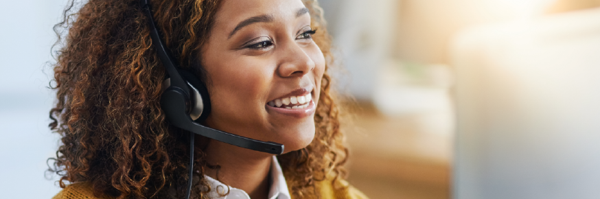 Woman speaking on the phone using a headset