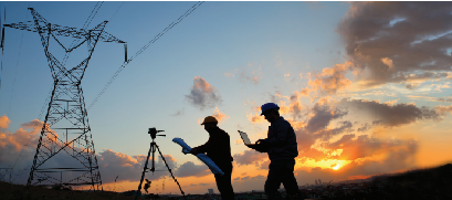 Transmission towers at sunset.