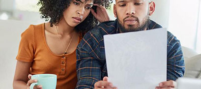 Customers reviewing Utility Customer Bill of Rights